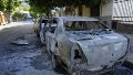 Los autos alcanzados por el fuego a metros de la cancha auriazul.